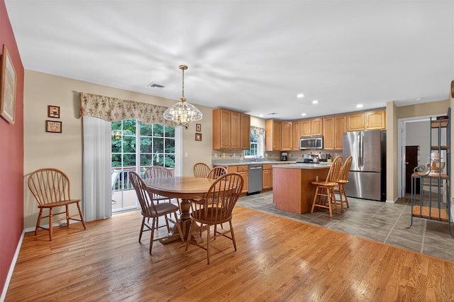 114 Bushwick Rd, Poughkeepsie, NY 12603 - dining space featuring a chandelier, plenty of natural light, light wood-style floors, and recessed lighting