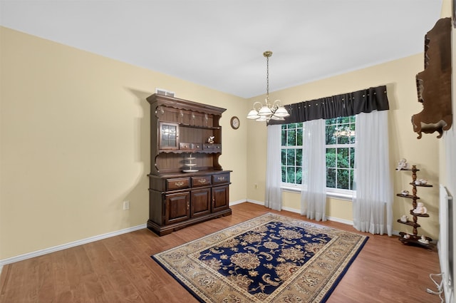 114 Bushwick Rd, Poughkeepsie, NY 12603 - dining area with a chandelier and wood finished floors