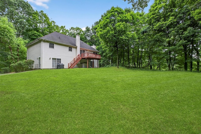 114 Bushwick Rd, Poughkeepsie, NY 12603 - view of grassy yard with stairway and a deck