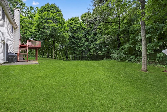 114 Bushwick Rd, Poughkeepsie, NY 12603 - view of grassy yard featuring a deck and stairway