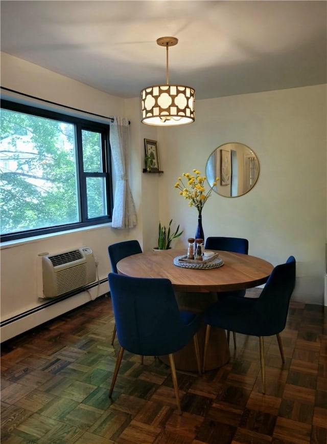 505 Central Ave Unit 618, White Plains, NY 10606 - dining area featuring a baseboard heating unit and a wall unit AC