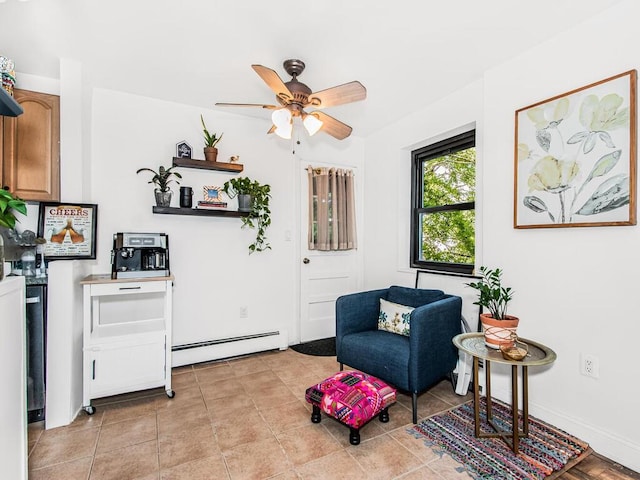 505 Central Ave Unit 618, White Plains, NY 10606 - sitting room featuring a baseboard heating unit and a ceiling fan