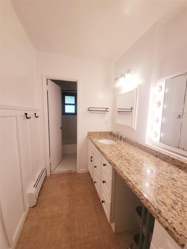 505 Central Ave Unit 618, White Plains, NY 10606 - full bath featuring a baseboard heating unit, vanity, tile patterned floors, and a shower