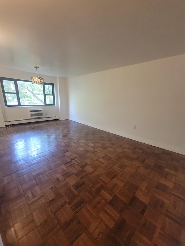 505 Central Ave Unit 618, White Plains, NY 10606 - empty room featuring baseboards and an AC wall unit