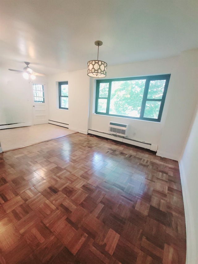 505 Central Ave Unit 618, White Plains, NY 10606 - spare room with a baseboard radiator and a ceiling fan
