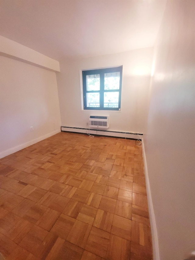 505 Central Ave Unit 618, White Plains, NY 10606 - spare room featuring a wall mounted air conditioner and baseboard heating