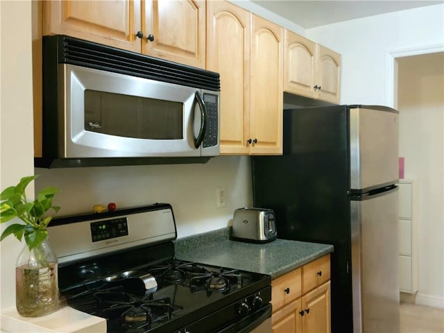 505 Central Ave Unit 618, White Plains, NY 10606 - kitchen with appliances with stainless steel finishes and light brown cabinets