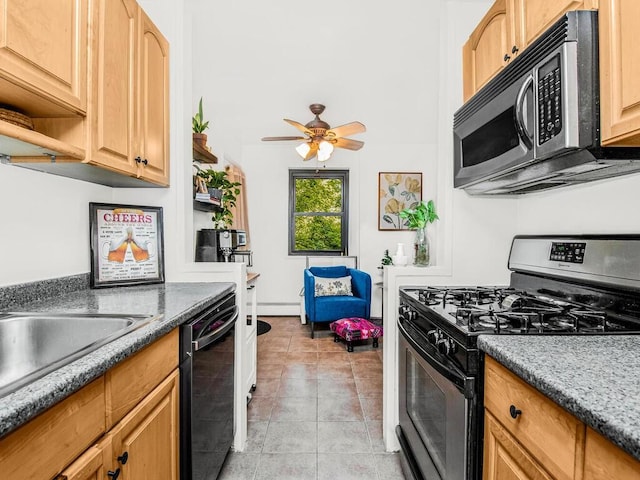 505 Central Ave Unit 618, White Plains, NY 10606 - kitchen with gas range oven, dishwasher, stainless steel microwave, ceiling fan, and light tile patterned flooring