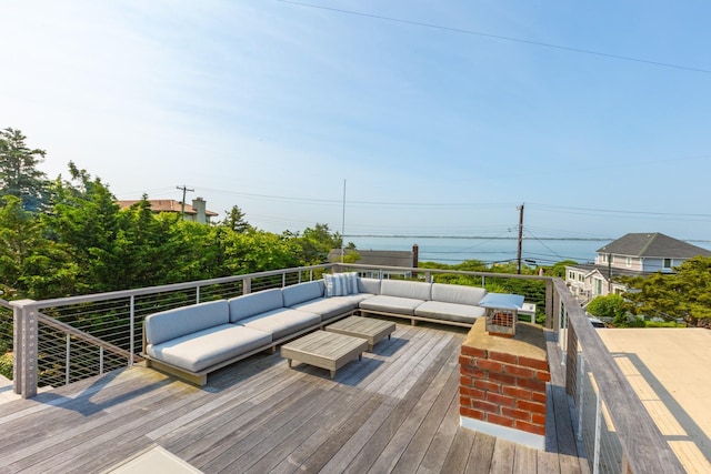 66 Hawser Dr, Oak Beach, NY 11702 - deck featuring an outdoor living space