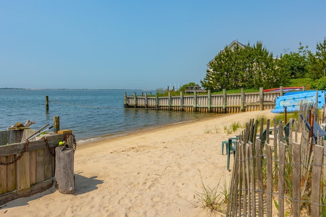 66 Hawser Dr, Oak Beach, NY 11702 - water view with a boat dock and local beach