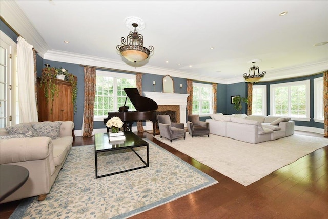 1616 Stewart Ln, Laurel Hollow, NY 11791 - living room with plenty of natural light, wood finished floors, ornamental molding, a premium fireplace, and recessed lighting
