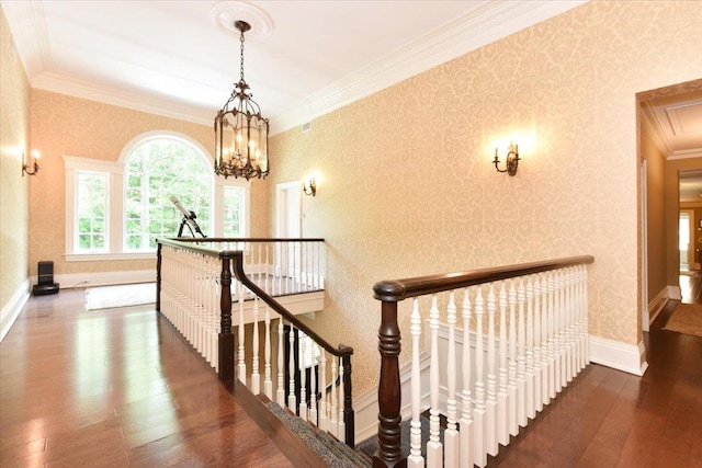 1616 Stewart Ln, Laurel Hollow, NY 11791 - stairs with hardwood / wood-style flooring, ornamental molding, wallpapered walls, and a chandelier