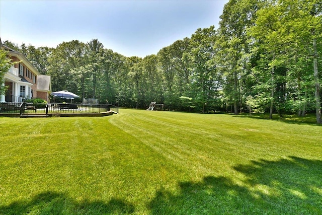 1616 Stewart Ln, Laurel Hollow, NY 11791 - view of green lawn featuring a wooden deck