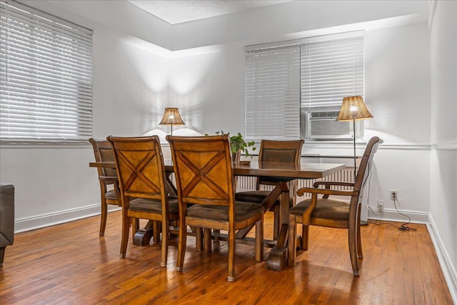 7817 Park Dr E Unit 1St, Kew Garden Hills, NY 11367 - dining area with cooling unit and wood-type flooring