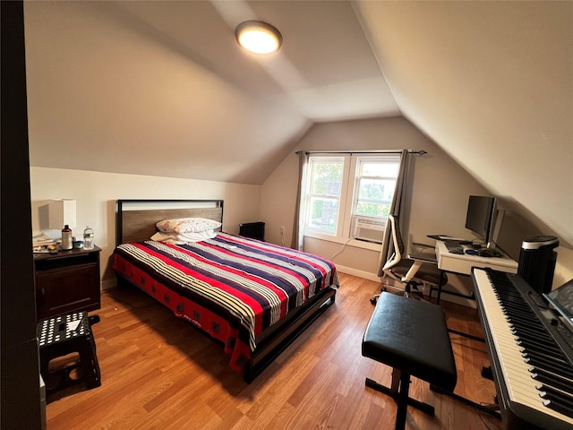 1602 Zerega Ave, Bronx, NY 10462 - bedroom featuring light wood-type flooring, vaulted ceiling, and cooling unit