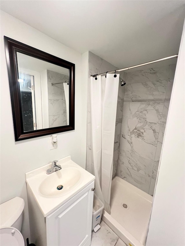 1602 Zerega Ave, Bronx, NY 10462 - bathroom featuring marble finish floors, vanity, and a stall shower