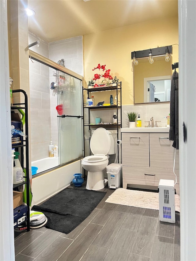 1602 Zerega Ave, Bronx, NY 10462 - full bathroom with enclosed tub / shower combo, vanity, and wood finish floors
