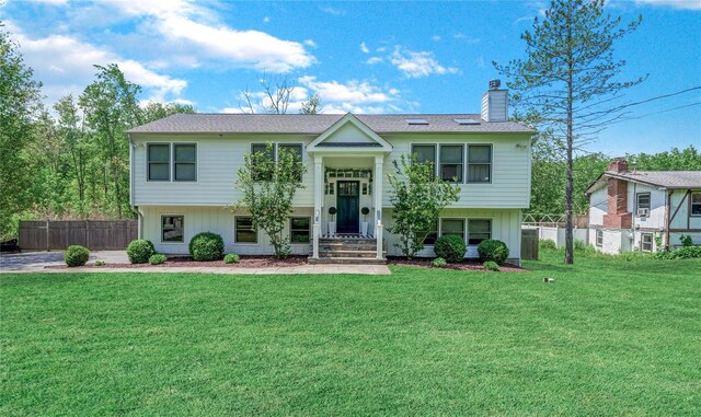 31 Pumphouse Rd, Brewster, NY 10509 - raised ranch with a chimney