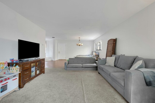 50 Dekalb Ave Unit S10, White Plains, NY 10605 - living room with a chandelier and carpet
