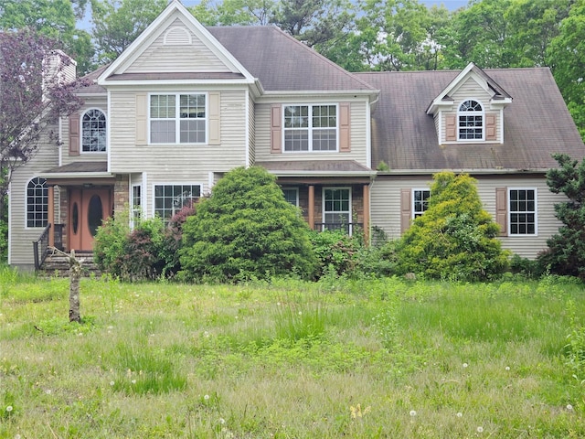 14 Christine Ct, Bohemia, NY 11716 - view of front of house with a chimney