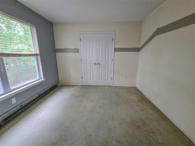 14 Christine Ct, Bohemia, NY 11716 - unfurnished bedroom featuring carpet floors and a closet