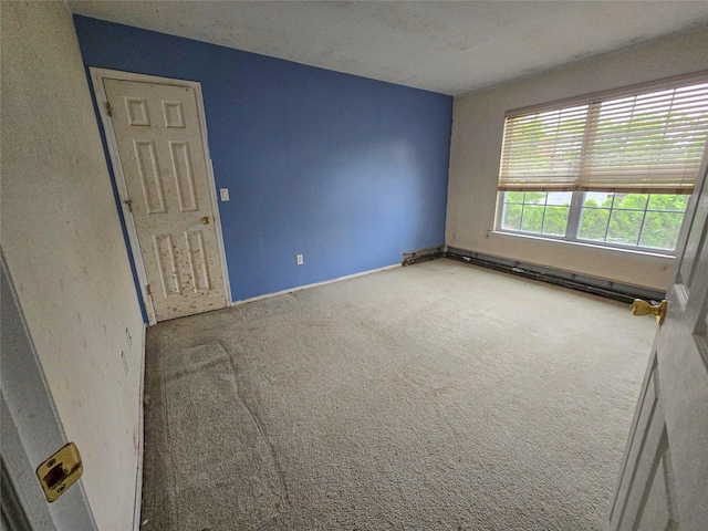 14 Christine Ct, Bohemia, NY 11716 - carpeted spare room featuring baseboards