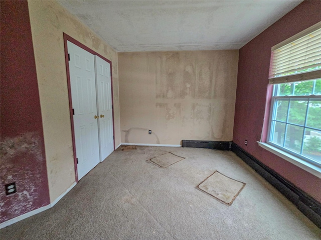 14 Christine Ct, Bohemia, NY 11716 - unfurnished bedroom with carpet floors and baseboards