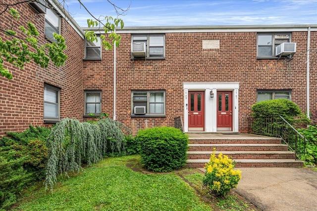 17-39 166th St Unit 3-68, Whitestone, NY 11357 - view of property featuring brick siding and cooling unit