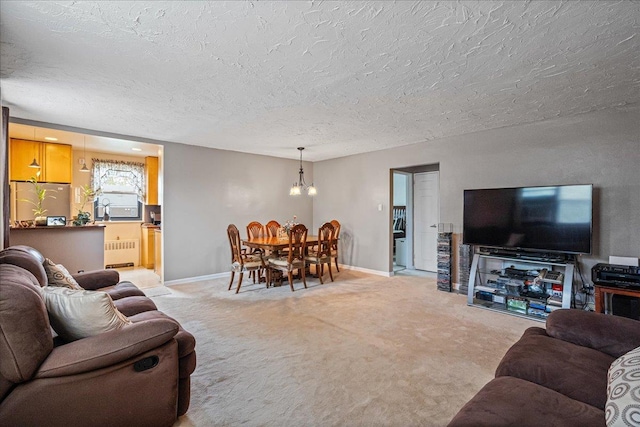 17-39 166th St Unit 3-68, Whitestone, NY 11357 - living area with radiator heating unit, light colored carpet, a chandelier, and a textured ceiling