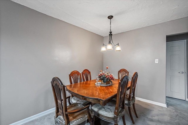 17-39 166th St Unit 3-68, Whitestone, NY 11357 - carpeted dining area featuring baseboards and a chandelier