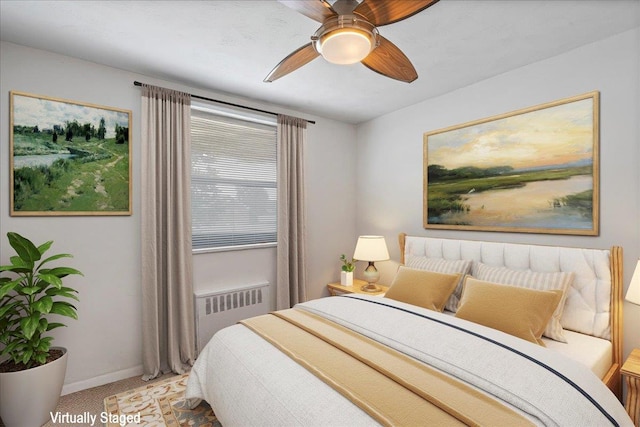 17-39 166th St Unit 3-68, Whitestone, NY 11357 - bedroom with radiator heating unit, carpet flooring, and a ceiling fan