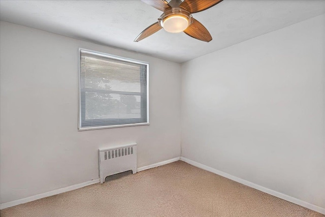 17-39 166th St Unit 3-68, Whitestone, NY 11357 - spare room with radiator, light colored carpet, and ceiling fan