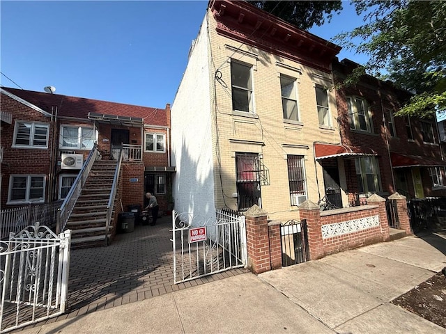 1363 64th St, Brooklyn, NY 11219 - view of property featuring a fenced front yard and stairs