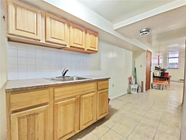 1363 64th St, Brooklyn, NY 11219 - kitchen featuring light brown cabinets, light tile patterned floors, and backsplash