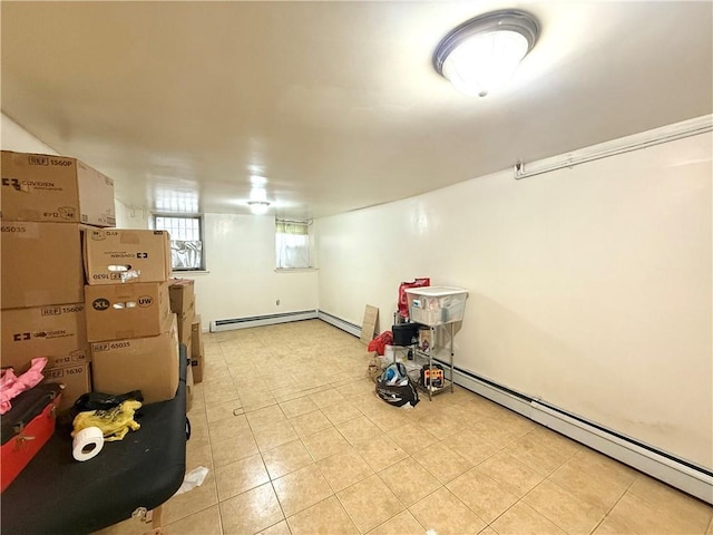 1363 64th St, Brooklyn, NY 11219 - below grade area with a baseboard heating unit and light tile patterned floors