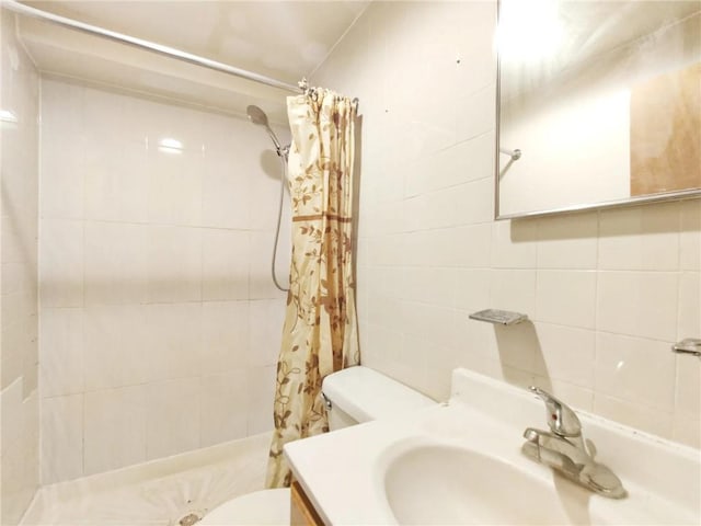 1363 64th St, Brooklyn, NY 11219 - full bath featuring a tile shower, vanity, and tile walls