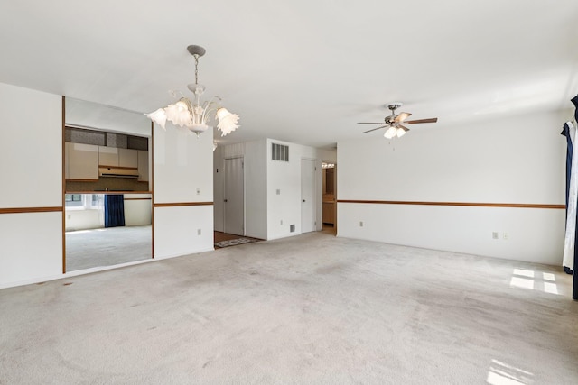 162 Deer Ct Dr, Middletown, NY 10940 - unfurnished living room featuring a chandelier, carpet, and a ceiling fan