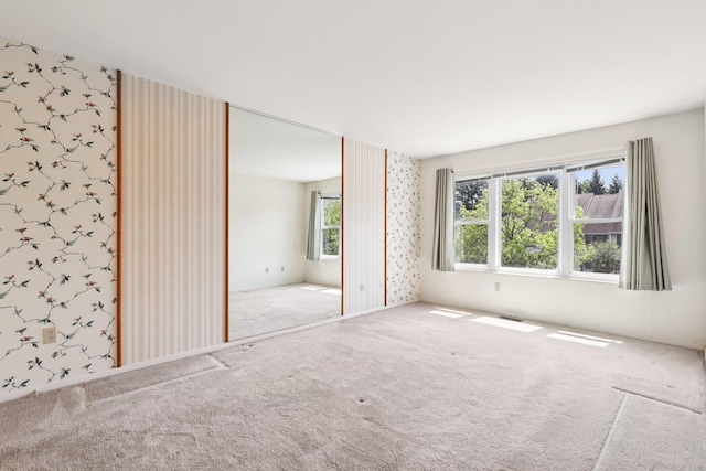 162 Deer Ct Dr, Middletown, NY 10940 - unfurnished room with carpet floors and wallpapered walls