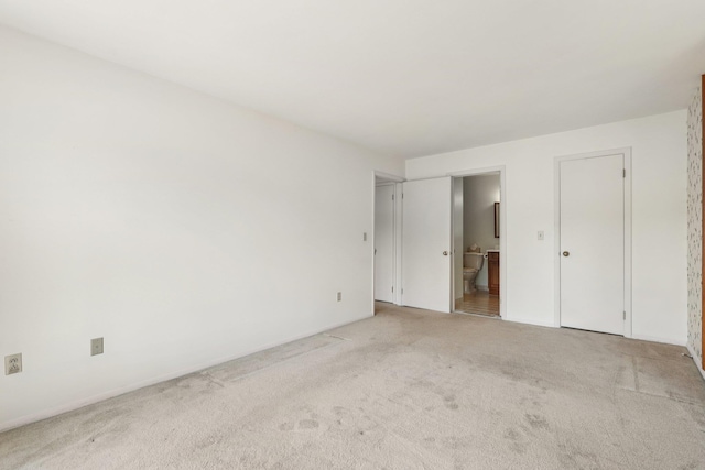 162 Deer Ct Dr, Middletown, NY 10940 - unfurnished bedroom featuring light carpet and ensuite bathroom