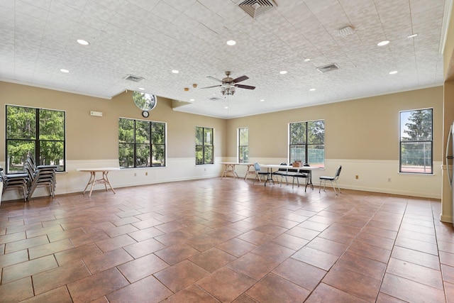 162 Deer Ct Dr, Middletown, NY 10940 - tiled empty room with plenty of natural light, recessed lighting, ceiling fan, and wainscoting