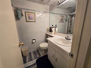 56 Pameeches Path, East Moriches, NY 11940 - full bathroom with vanity and a shower with shower door