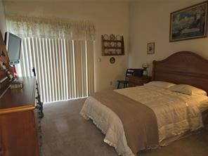 56 Pameeches Path, East Moriches, NY 11940 - bedroom featuring carpet floors