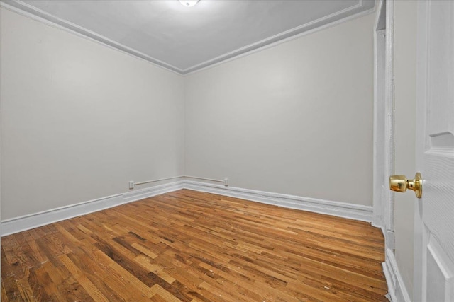 176 W 81st St Unit 3E, New York Manhattan, NY 10024 - spare room featuring wood finished floors and crown molding