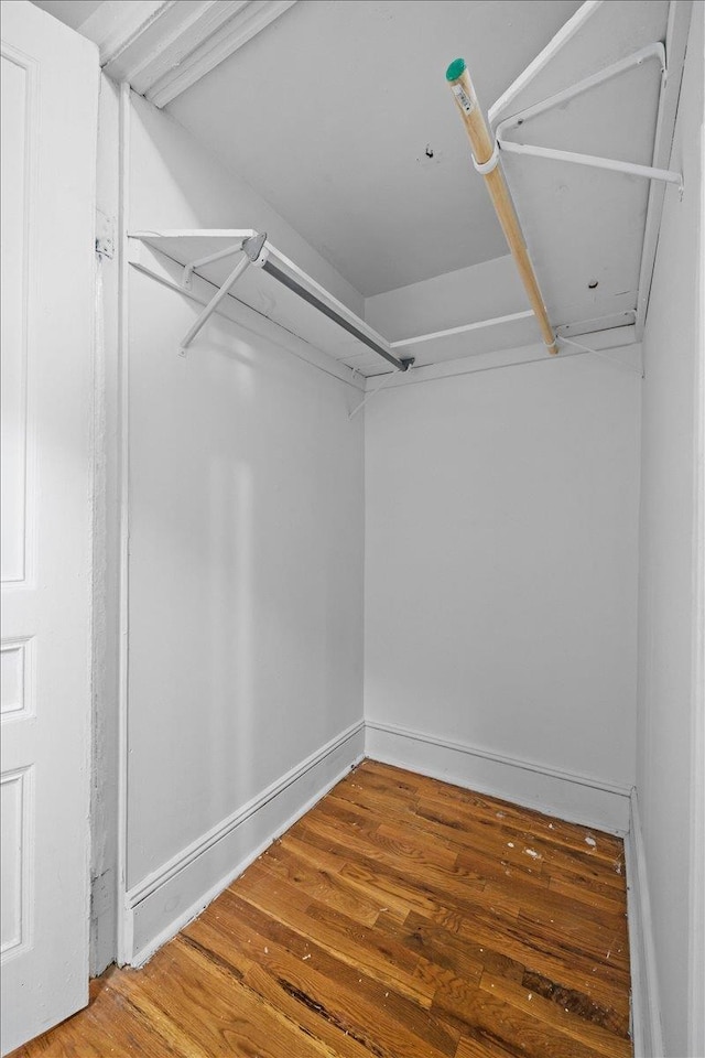 176 W 81st St Unit 3E, New York Manhattan, NY 10024 - walk in closet featuring wood finished floors