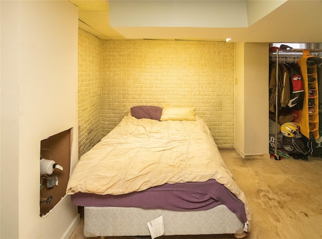 134 Elmcrest Dr, Fishkill, NY 12524 - carpeted bedroom featuring a closet and brick wall
