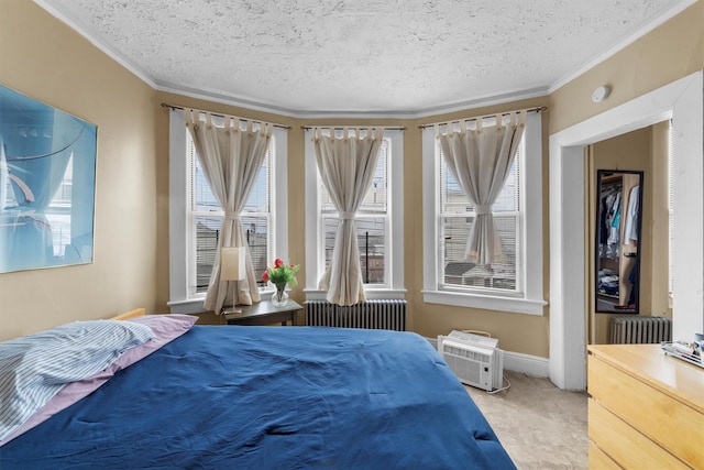 156 Beech St, Yonkers, NY 10701 - bedroom featuring radiator, ornamental molding, a textured ceiling, and multiple windows