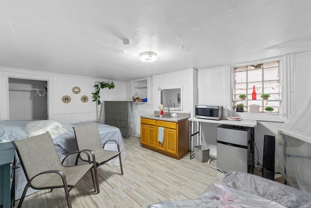 156 Beech St, Yonkers, NY 10701 - kitchen with stainless steel appliances, brown cabinets, and light countertops