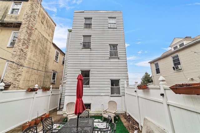 156 Beech St, Yonkers, NY 10701 - rear view of house featuring a fenced backyard