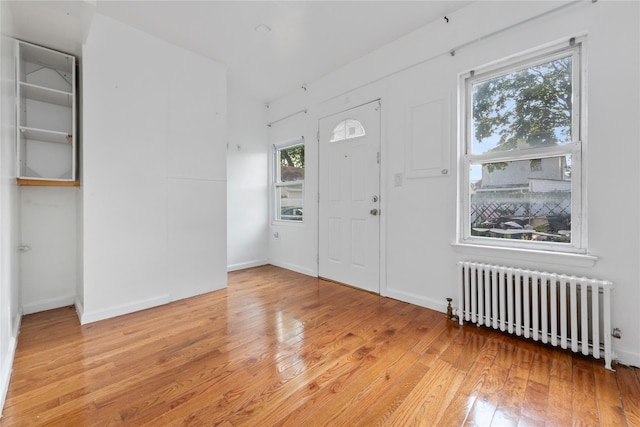 117-66 127th St, South Ozone Park, NY 11420 - foyer featuring radiator and hardwood / wood-style flooring