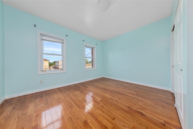 117-66 127th St, South Ozone Park, NY 11420 - empty room featuring hardwood / wood-style flooring and baseboards